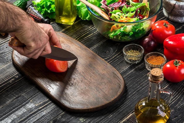 hands preparing meal on wooden board